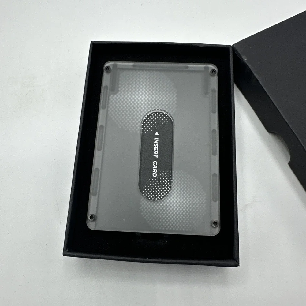 Minimalist Wallet Black New In Box With Extra Straps.